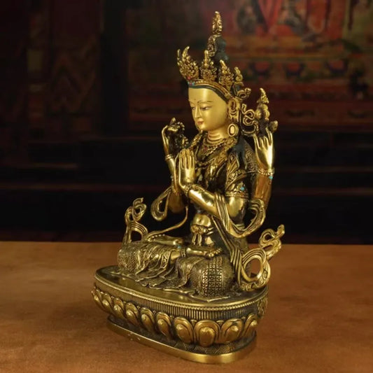 Antique Gilded Bronze Four-Armed Guanyin Statue