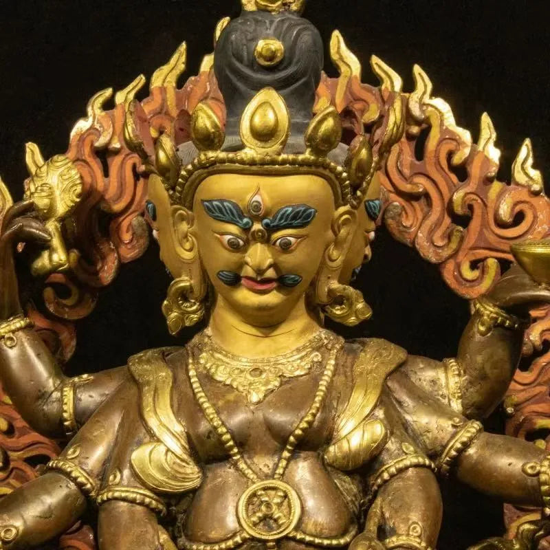 Rare Qing Dynasty Gilt Bronze Three-Faced and Six-Armed Black Jambhala Statue