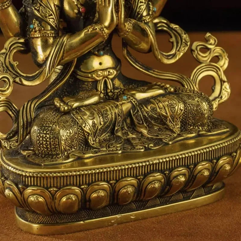 Antique Gilded Bronze Four-Armed Guanyin Statue